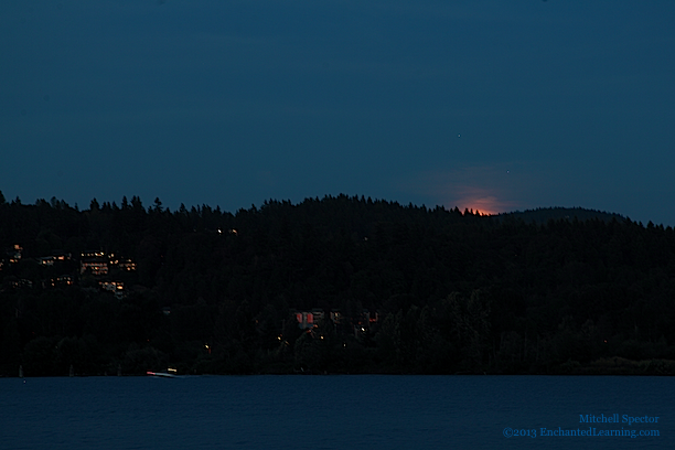 First Moonglow Above the Hills