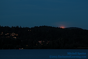 First Moonglow Above the Hills