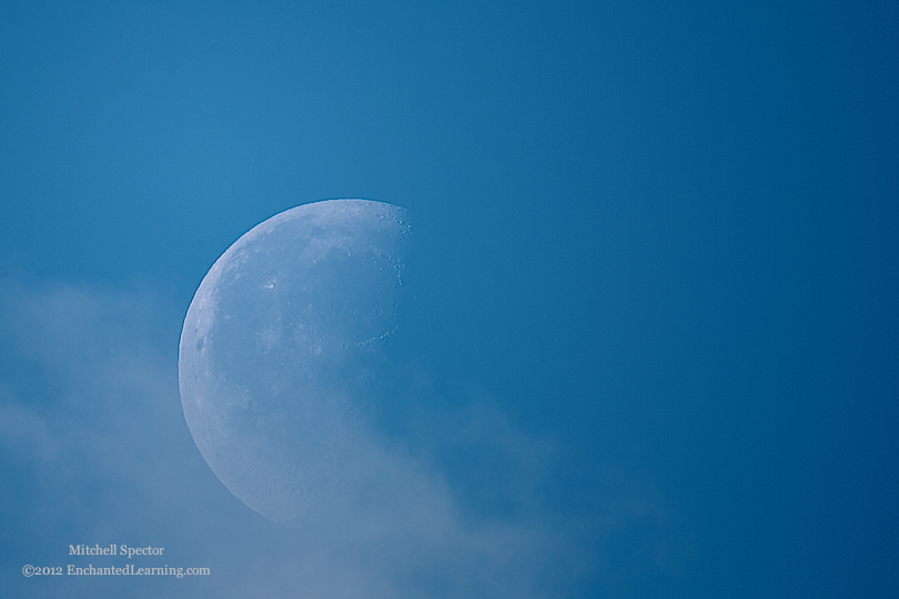 Clouds Moving in Front of the Daylight Moon