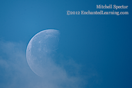 Clouds Moving in Front of the Daylight Moon